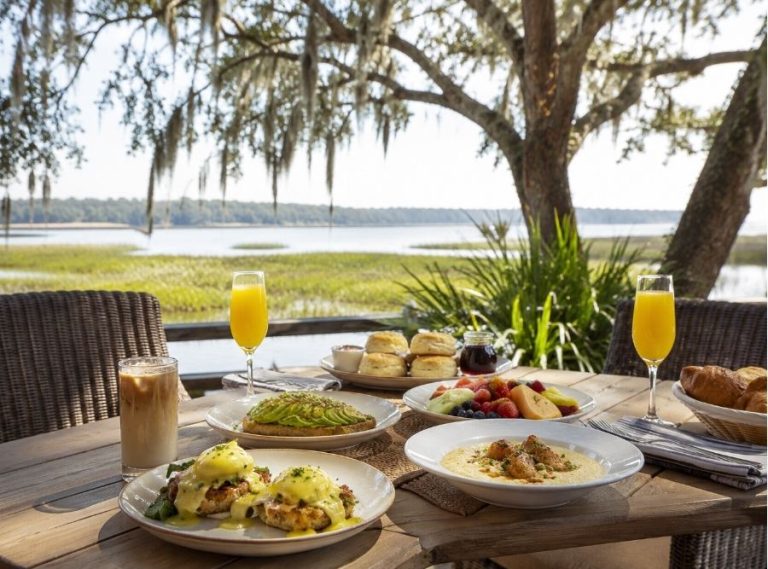 Luxury brunch spread on an outdoor patio overlooking the marsh on Hilton Head Island
