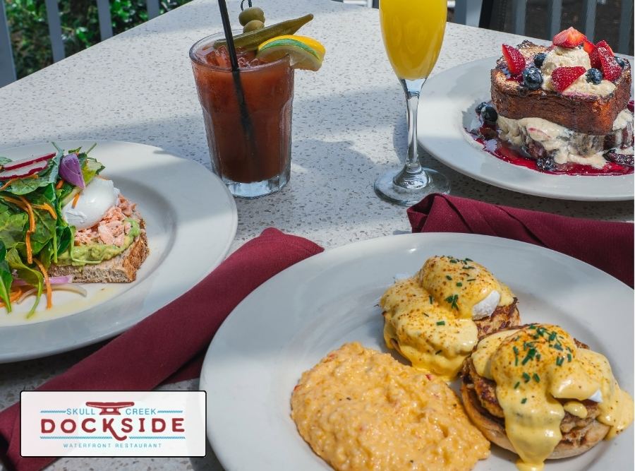 Skull Creek Dockside waterfront views, your favorite brunch dishes, refreshing cocktails, and a laid-back atmosphere